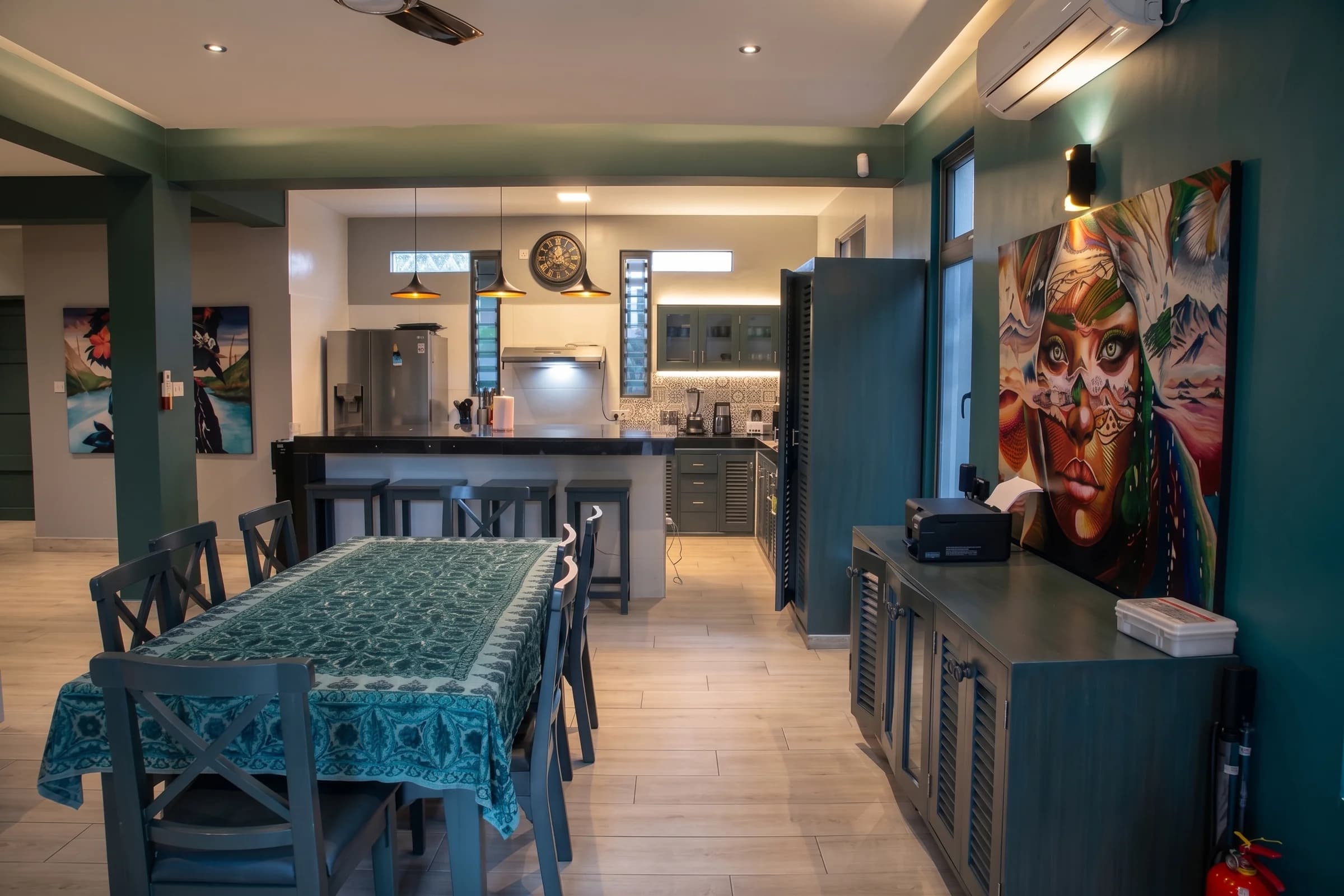 Gourmet chef kitchen connected to handcrafted hardwood dining area at The Coastal Estate