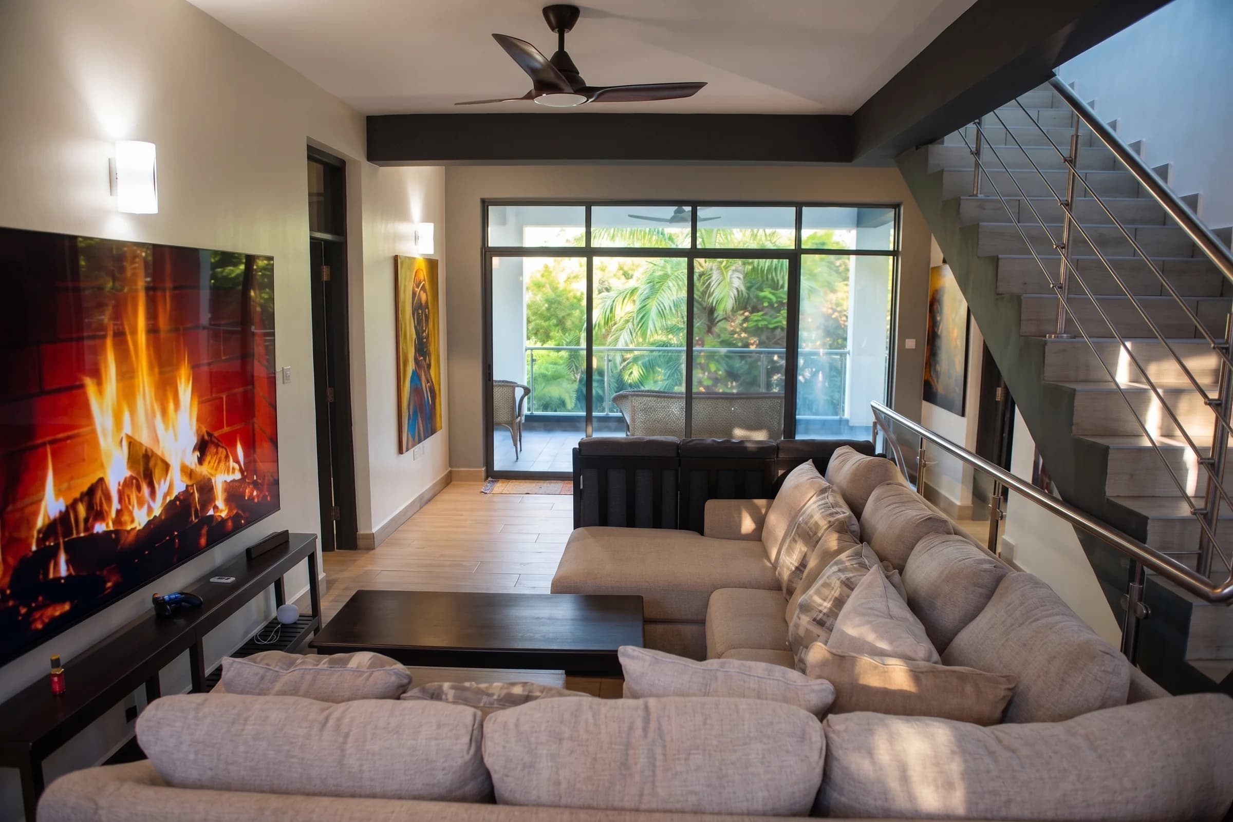 First floor intimate family lounge with comfortable seating and private terrace access