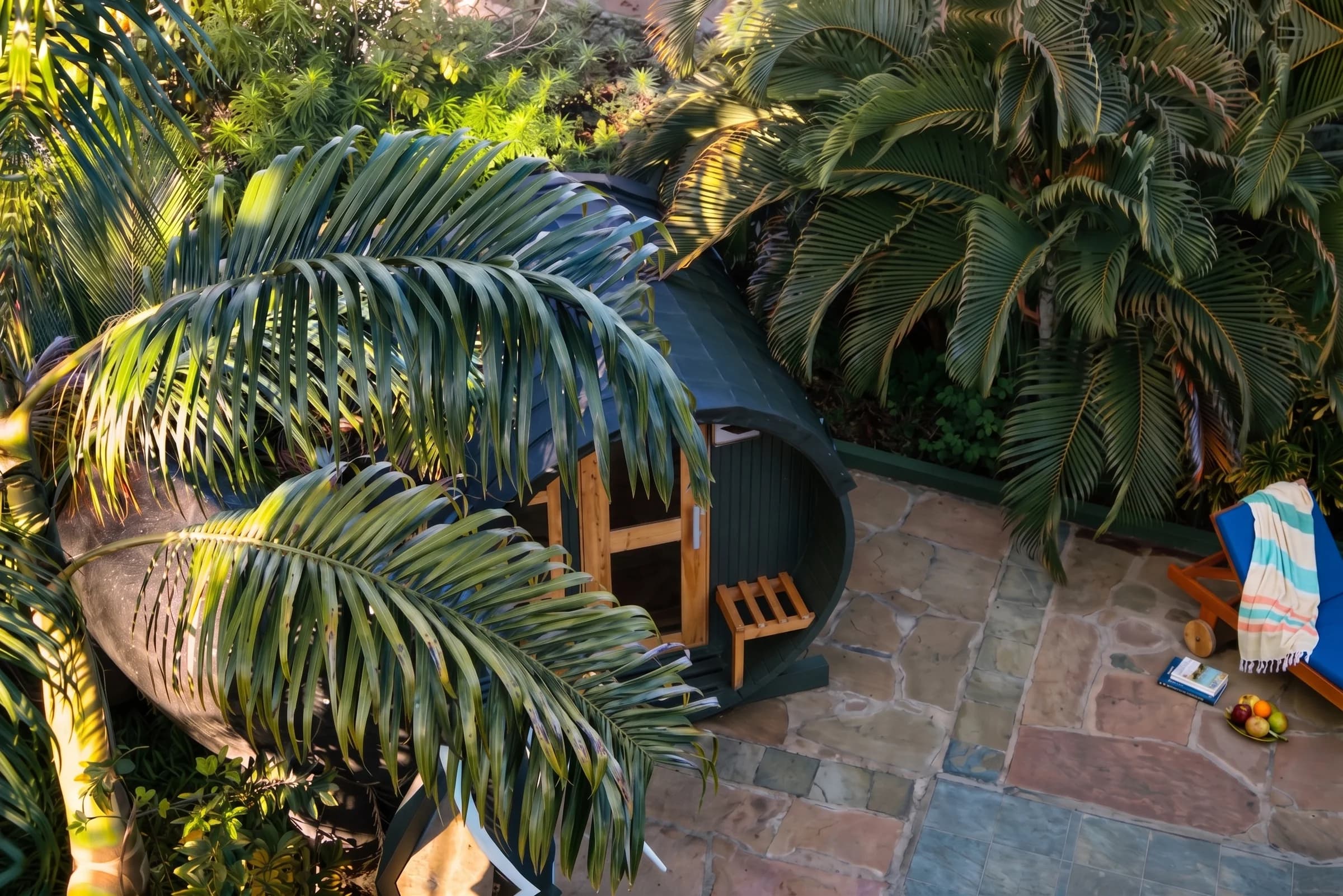 Private Finnish wooden wellness sauna located steps from the swimming pool at The Coastal Estate