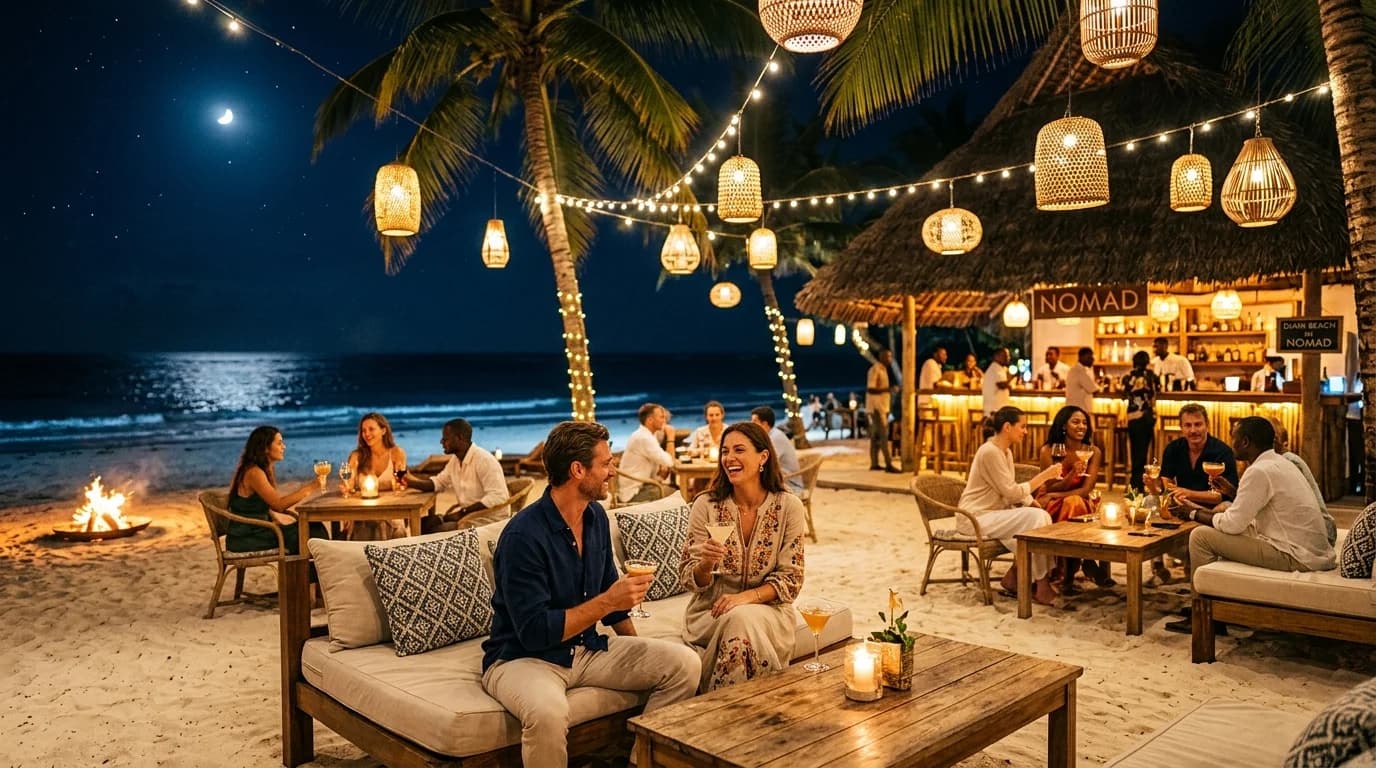 Vibrant barefoot beachfront cocktail lounge in Diani under illuminated palm trees, woven hanging lanterns, and oceanfront bonfire